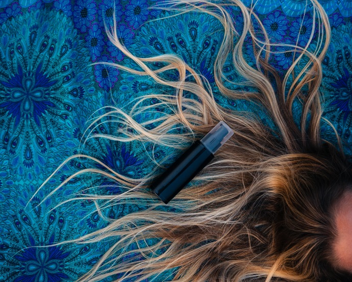 picture of a hair on a blue background