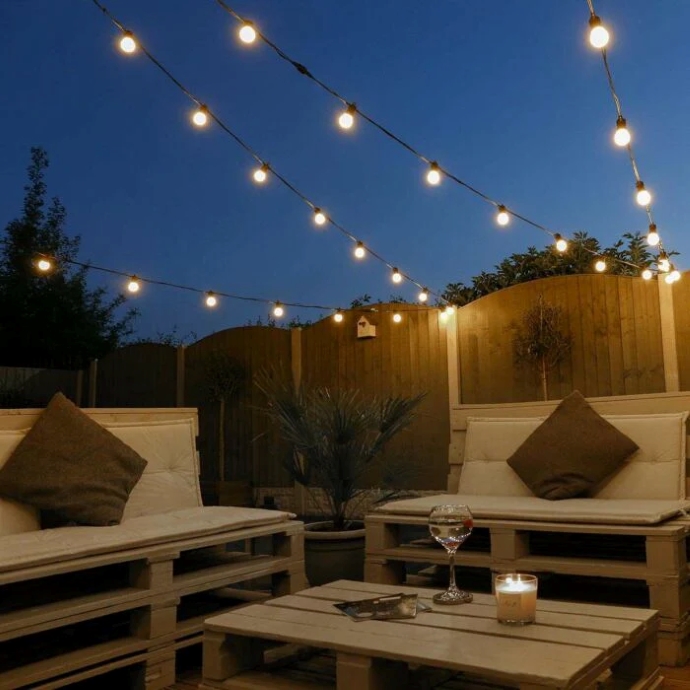 backyard decorated with festoon bulbs